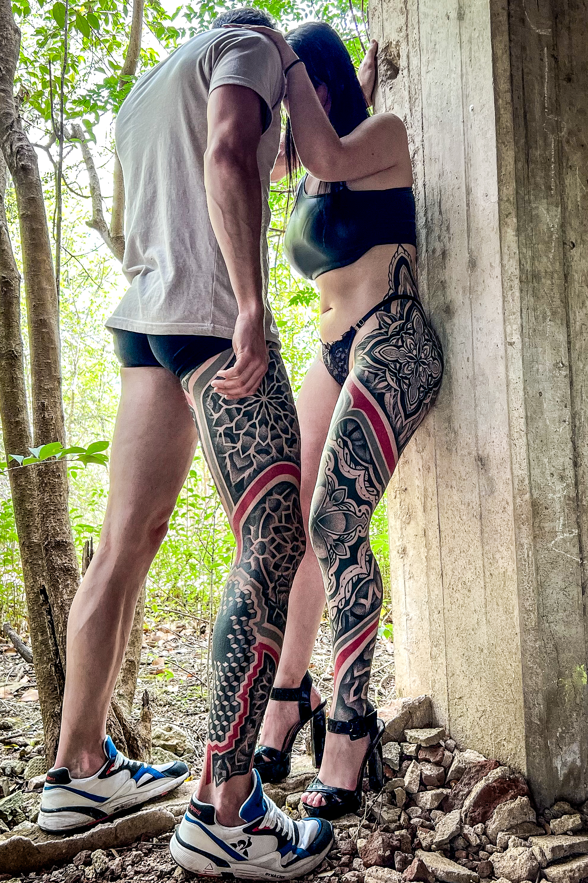 Large-scale ornamental blackwork leg tattoos by Diego Juarez at Diroka Tattoo Studio